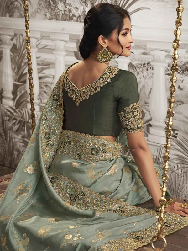 Mint green zari work silk saree