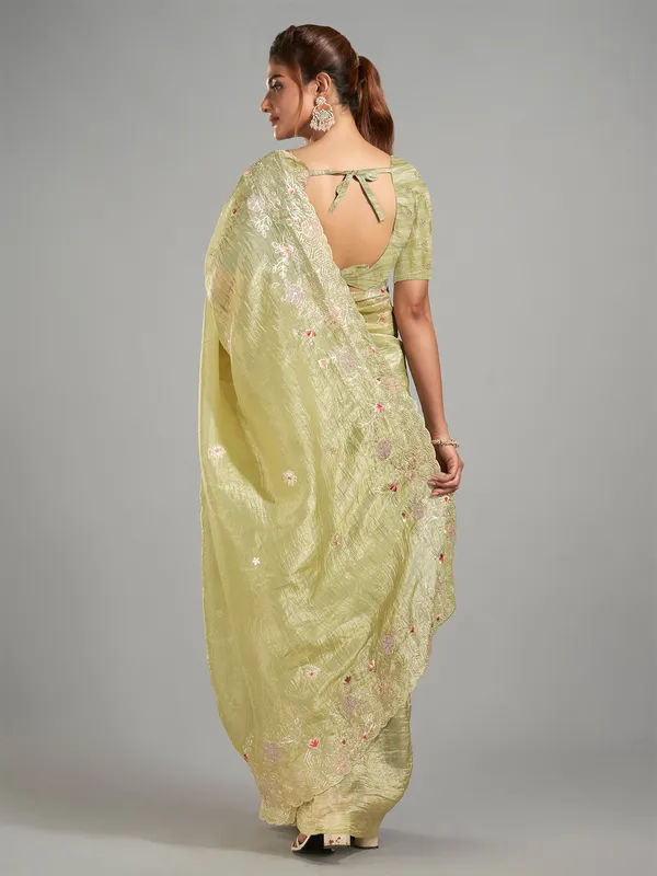 Moss green tissue silk saree