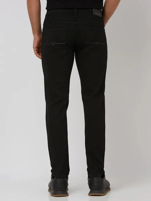 MUFTI solid black ankle length denim jeans