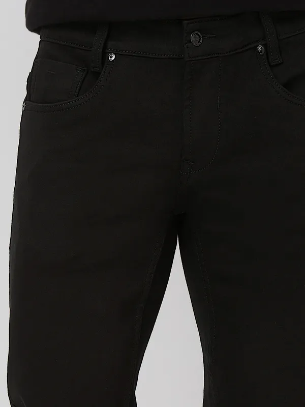 MUFTI solid black ankle length denim jeans