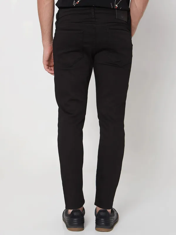 MUFTI solid black ankle length fit denim jeans