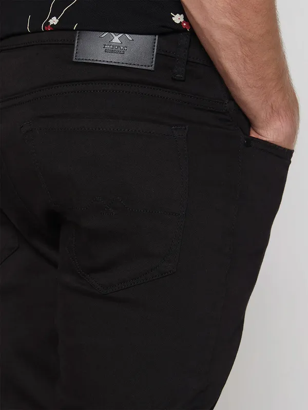 MUFTI solid black denim with ankle fit