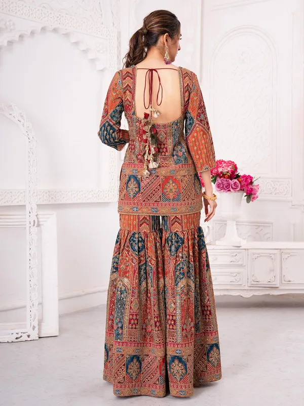 Multi color pakistani silk sharara suit with zardosi detailing