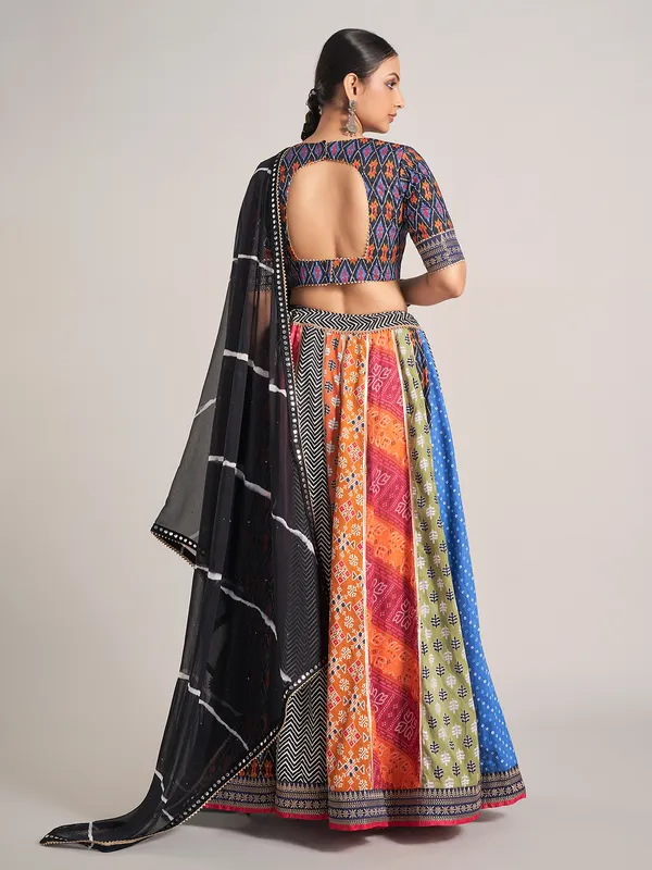 Multi color printed silk mirror work navratri chaniya choli