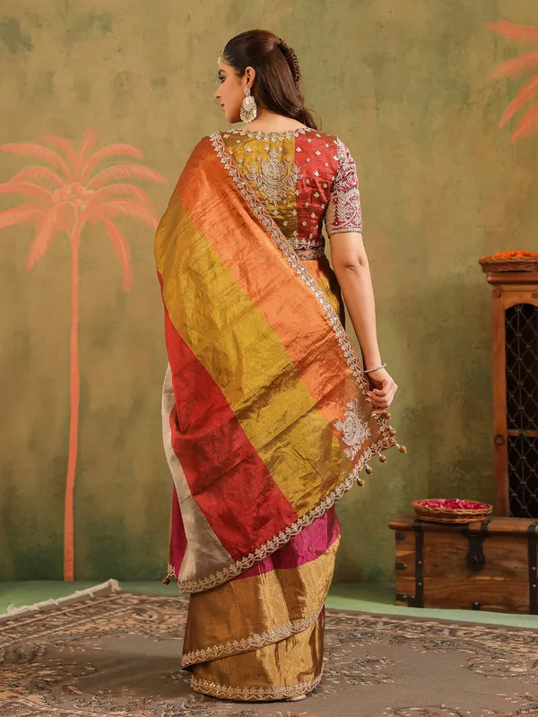 Multi color tissue silk saree with unstitched blouse