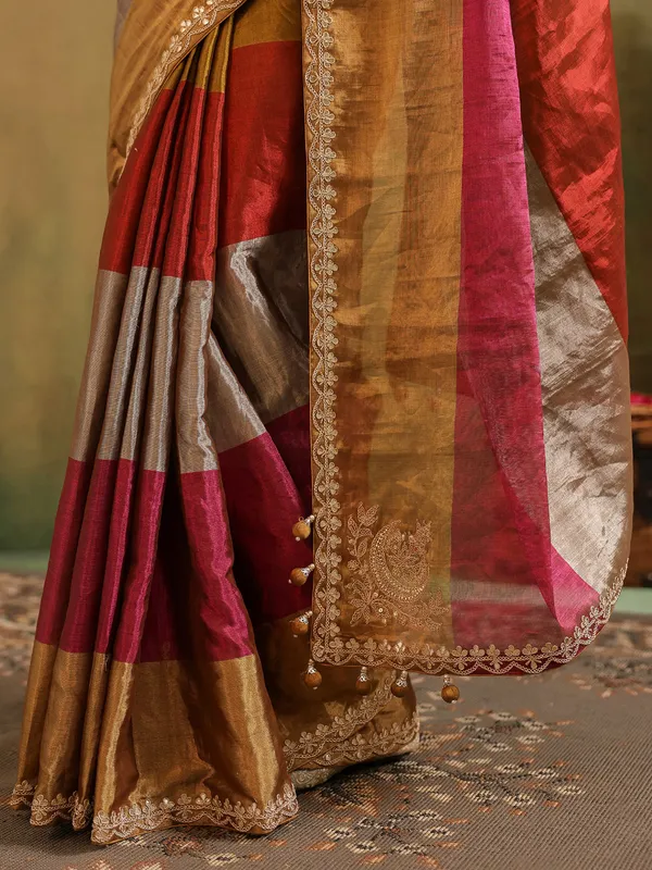 Multi color tissue silk saree with unstitched blouse