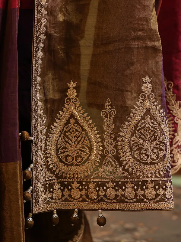 Multicolor tissue silk saree with festive finish