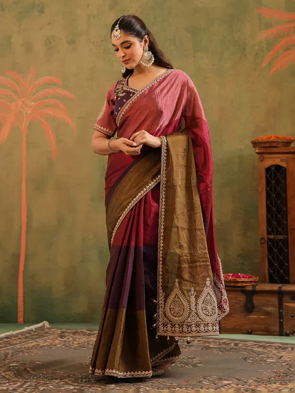 Multicolor tissue silk saree with festive finish