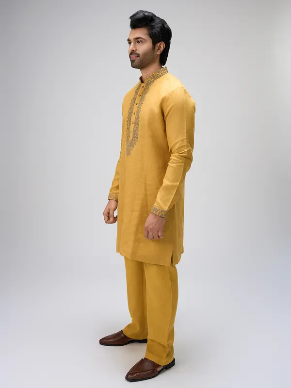 Mustard crafted thread linen kurta ensemble