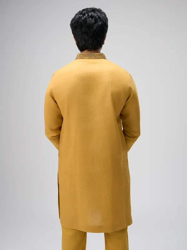 Mustard crafted thread linen kurta ensemble