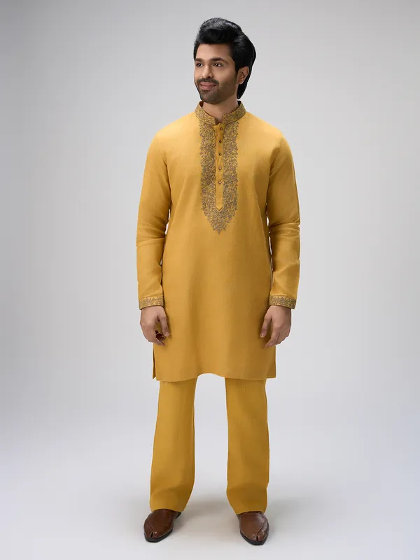 Mustard crafted thread linen kurta ensemble