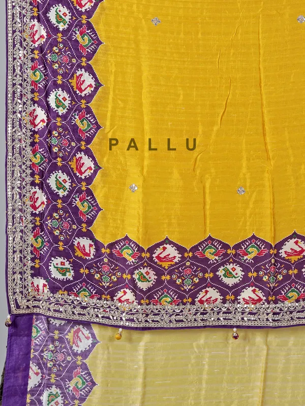 Mustard yellow and purple patola silk saree