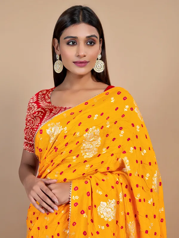 Mustard yellow bandhej wedding look saree