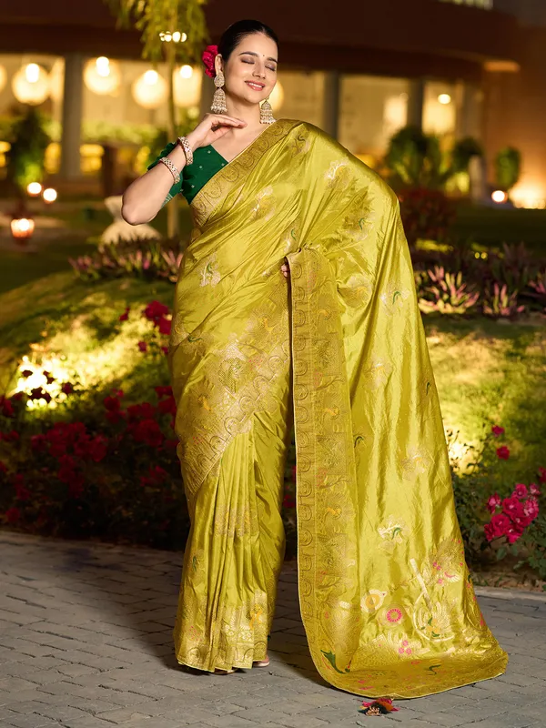 Mustard yellow dola silk saree with stone zari weaving