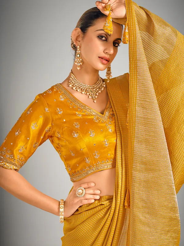 Mustard yellow dola silk zari weaving saree