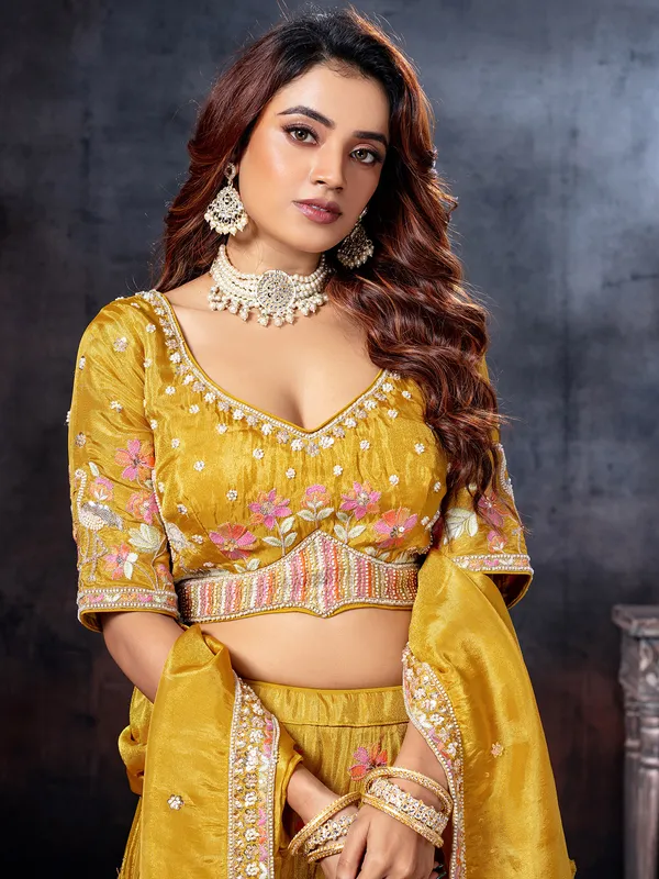 Mustard yellow embellished bridal lehenga choli