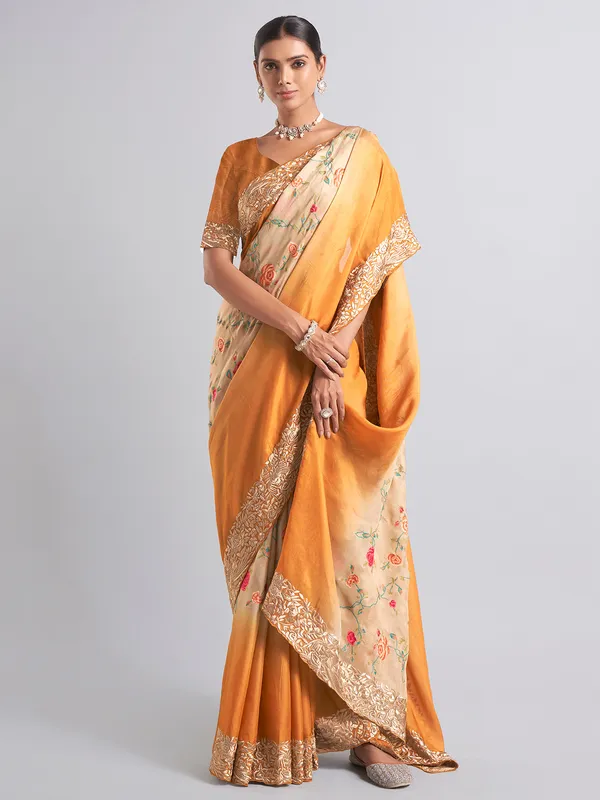 Mustard yellow georgette saree for reception