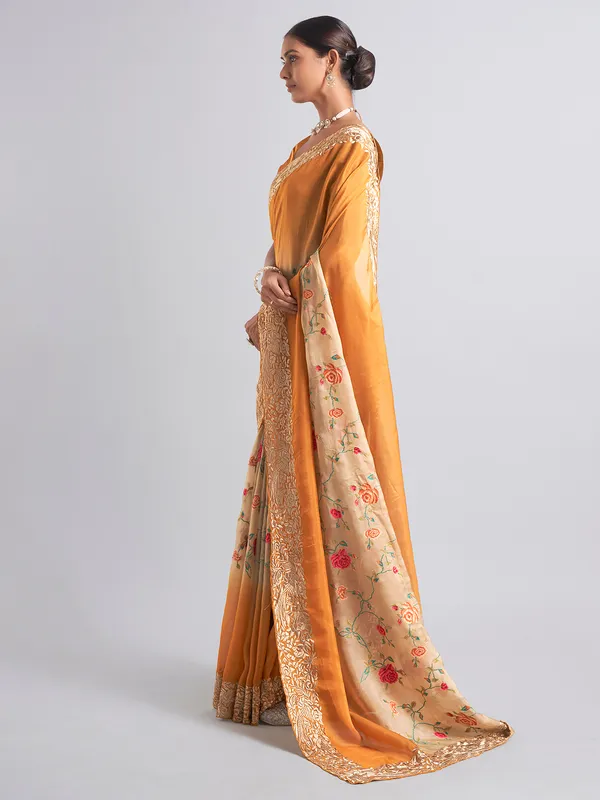 Mustard yellow georgette saree for reception