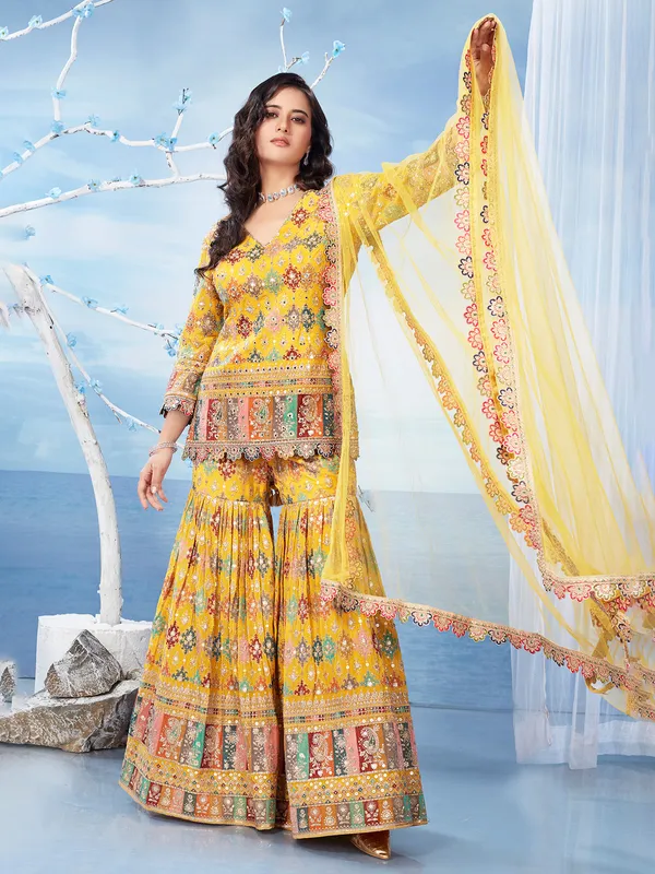 Mustard yellow georgette sharara suit for wedding