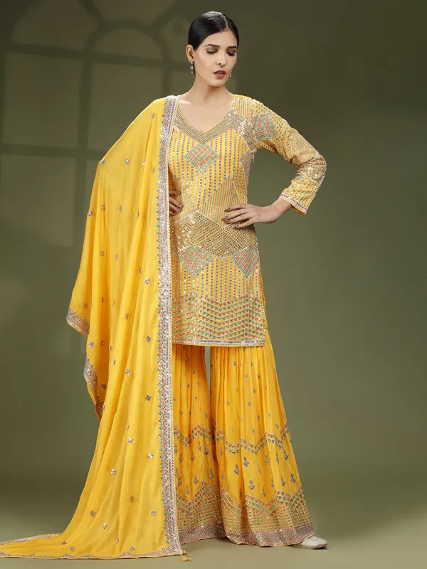 Mustard yellow georgette sharara suit with dupatta
