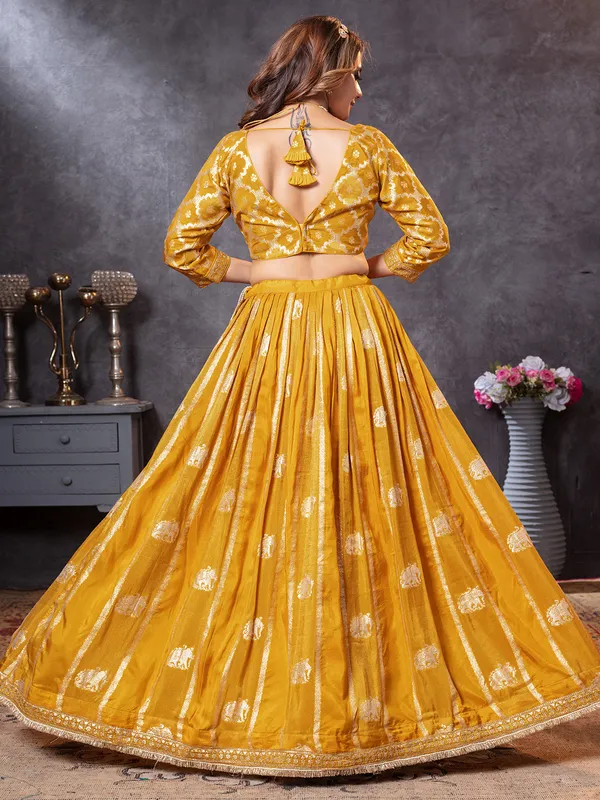 Mustard yellow haldi resham and zari lehenga choli