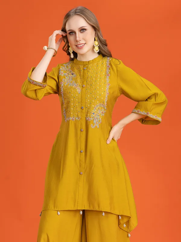 Mustard yellow kurti set with traditional accents