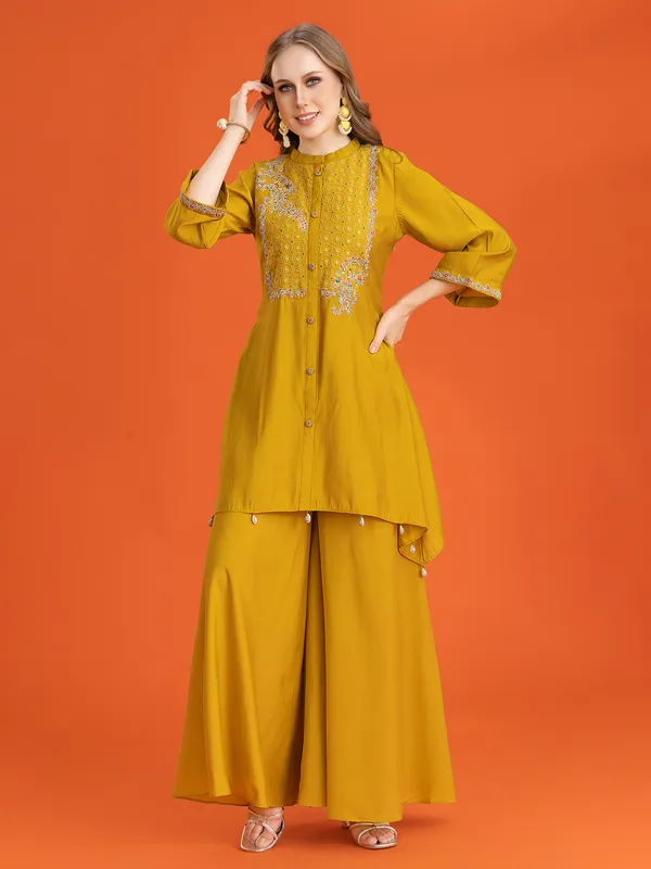 Mustard yellow kurti set with traditional accents
