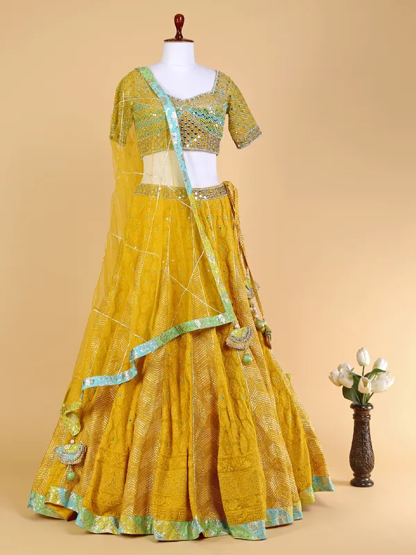 Mustard yellow lehenga choli with net dupatta