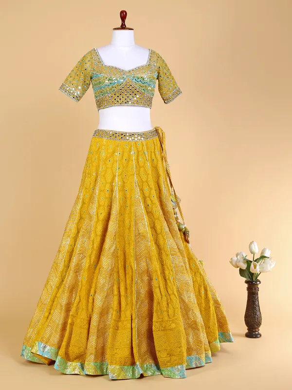 Mustard yellow lehenga choli with net dupatta