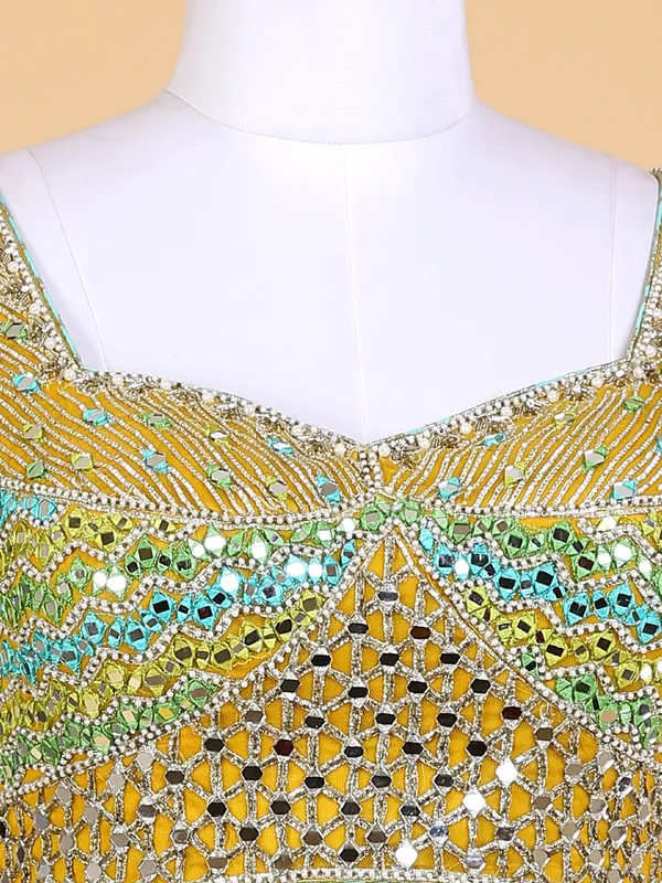 Mustard yellow lehenga choli with net dupatta