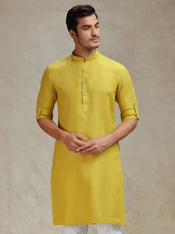 Mustard yellow linen kurta for haldi ceremony