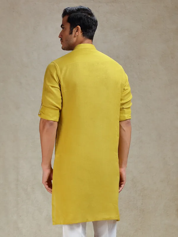 Mustard yellow linen kurta for haldi ceremony