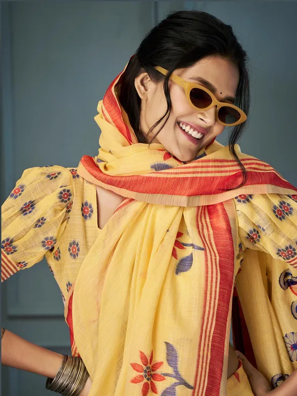 Mustard yellow linen saree with contrast border