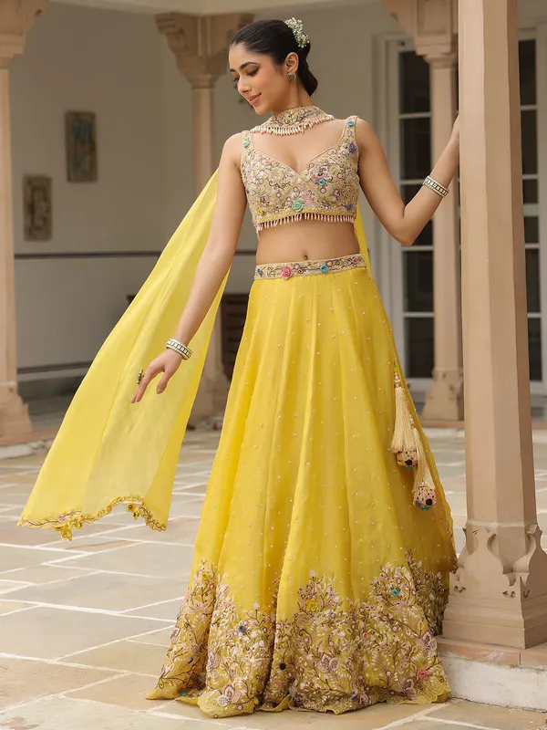 Mustard yellow organza lehenga choli with dupatta
