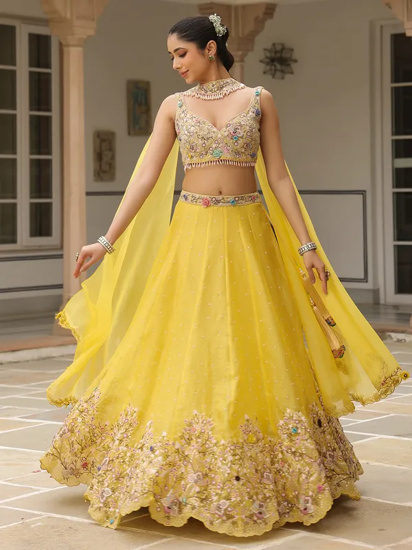 Mustard yellow organza lehenga choli with dupatta