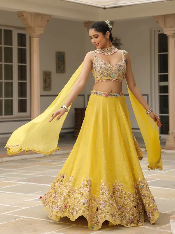 Mustard yellow organza lehenga choli with dupatta