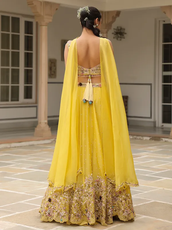 Mustard yellow organza lehenga choli with dupatta
