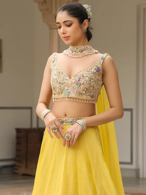 Mustard yellow organza lehenga choli with dupatta