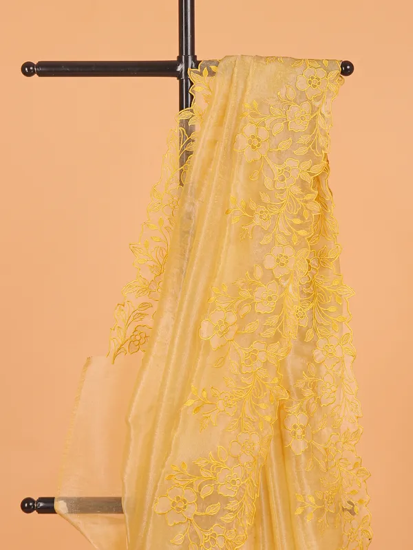Mustard yellow organza saree for wedding wear