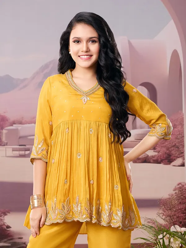 Mustard yellow palazzo designer suit with beads work
