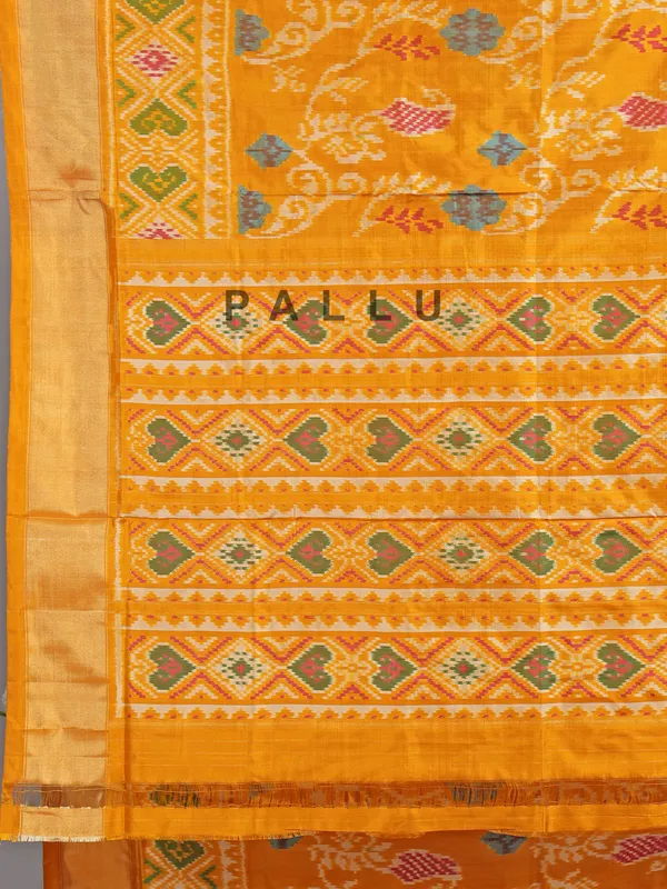 Mustard yellow patola silk saree for haldi glow