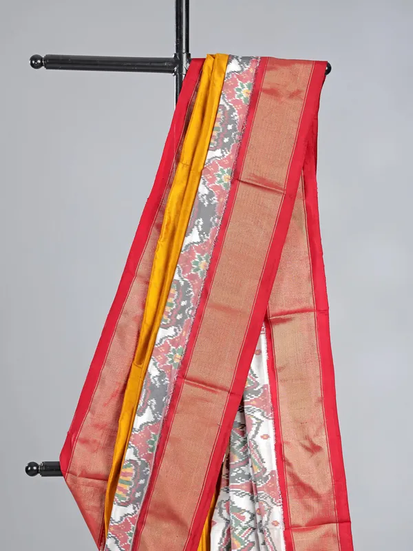Mustard yellow patola silk saree for wedding wear