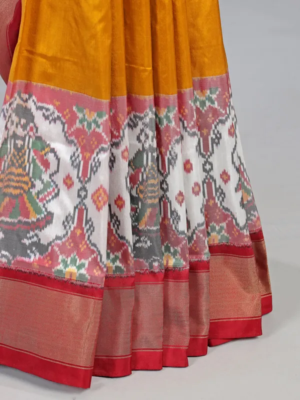 Mustard yellow patola silk saree for wedding wear