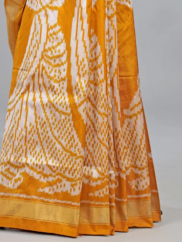 Mustard yellow patola silk saree with print