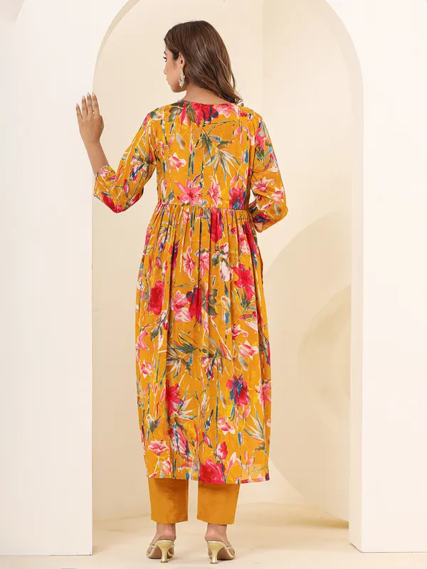 Mustard yellow printed alia cut kurti set