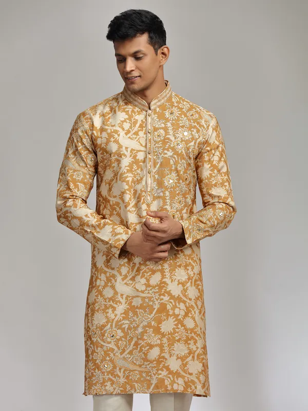 Mustard yellow printed festive wear silk kurta suit