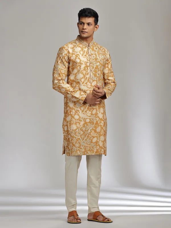 Mustard yellow printed festive wear silk kurta suit