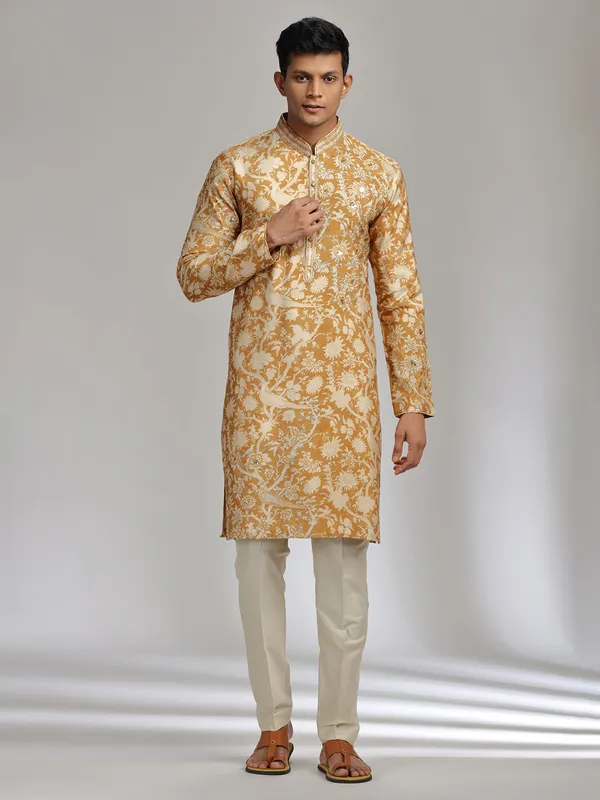 Mustard yellow printed festive wear silk kurta suit