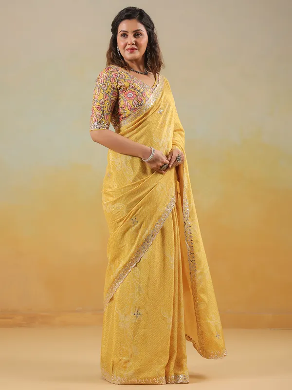 Mustard yellow printed saree in muslin