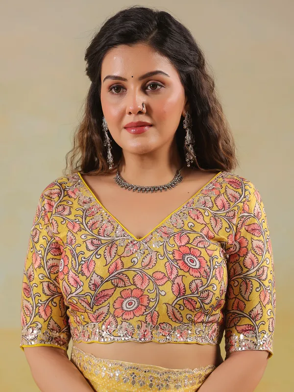 Mustard yellow printed saree in muslin